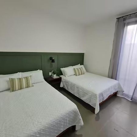 Urban Justo Sierra Aparthotel Guadalajara Bagian luar foto