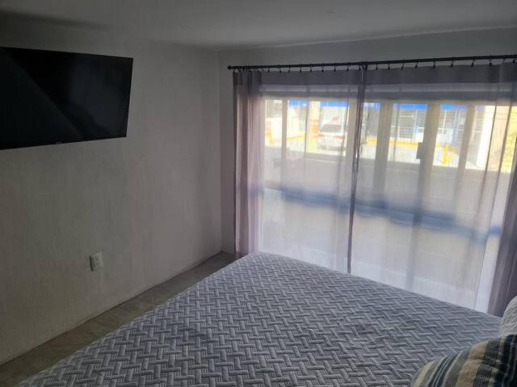 Urban Justo Sierra Aparthotel Guadalajara Bagian luar foto